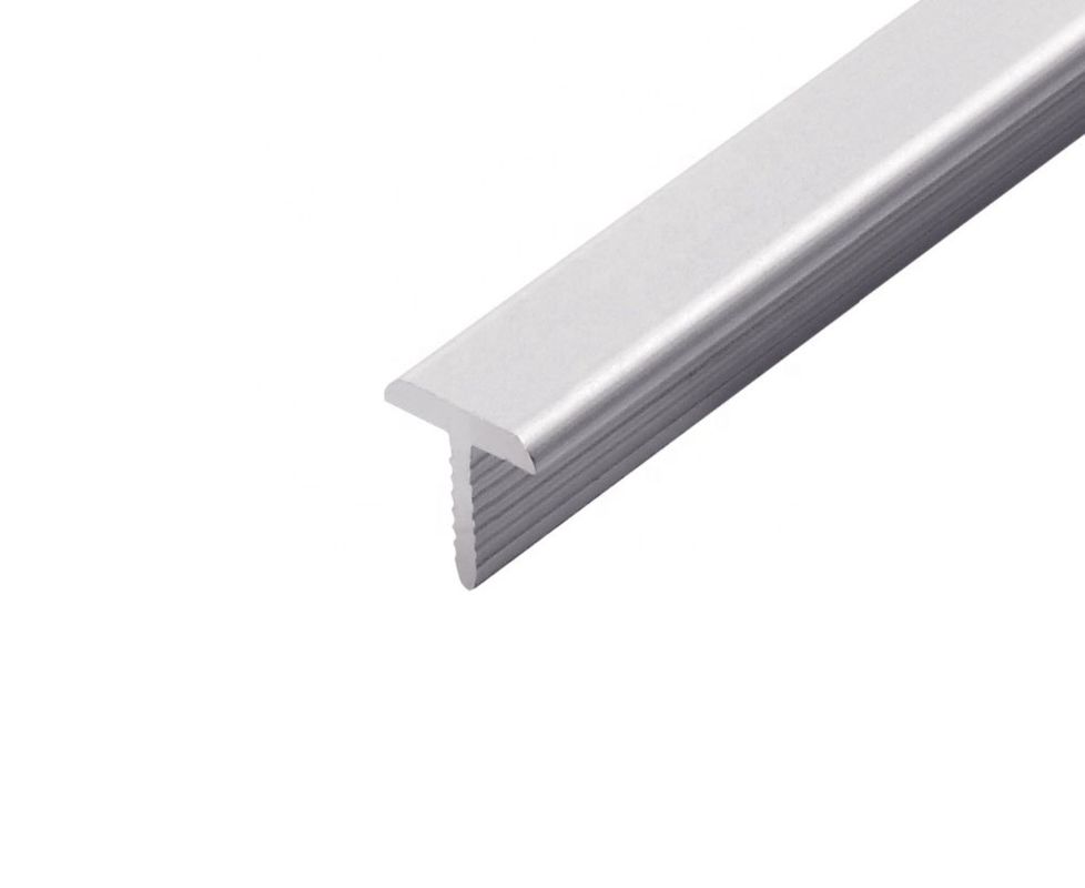 La tira de ribete plana de aluminio del piso de la lamina de la tira de la hebilla alta-baja anodizó